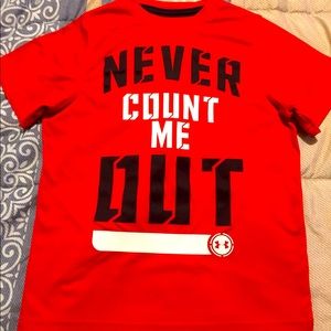 A youth small loose heat gear Under Armour shirt